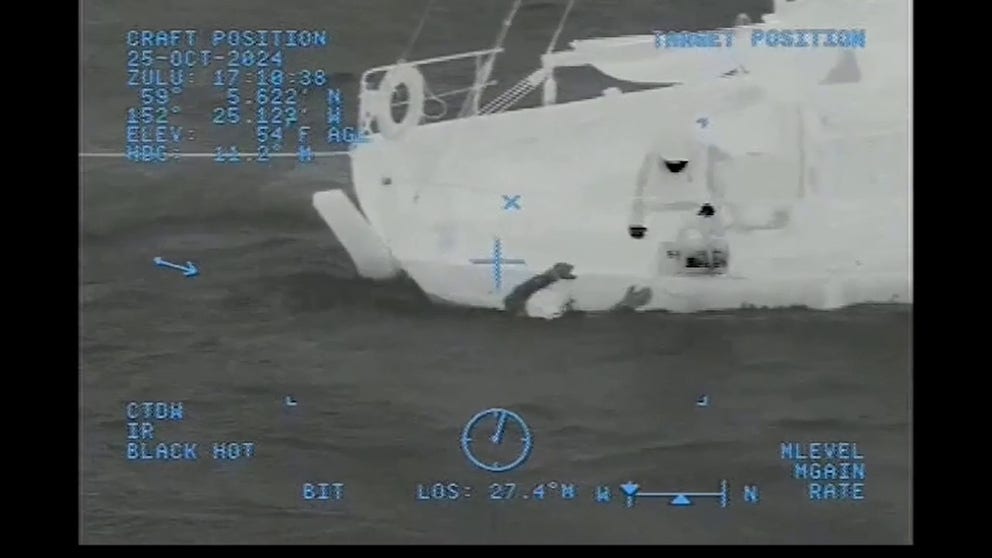 A man and his cat were rescued by the U.S. Coast Guard Oct. 25 after becoming adrift amid rough seas off the southern Alaska coast. (Courtesy: U.S. Coast Guard /TMX)