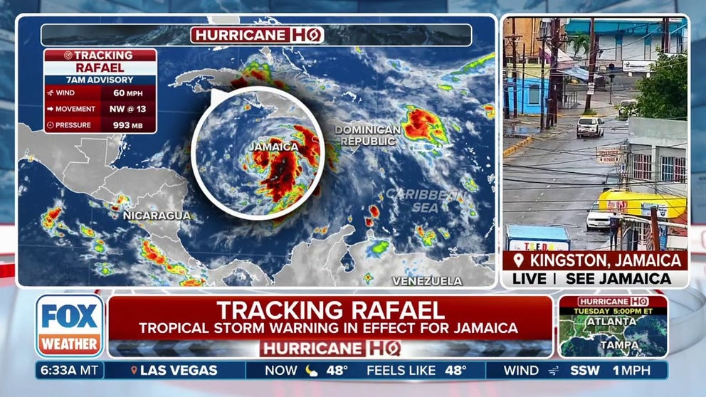 Tropical Storm Rafael is continuing to batter the western Caribbean with strong winds and torrential rain as the late-season system continues to gain strength on its journey to the north where it's likely to intensify into a hurricane before emerging in the Gulf of Mexico.