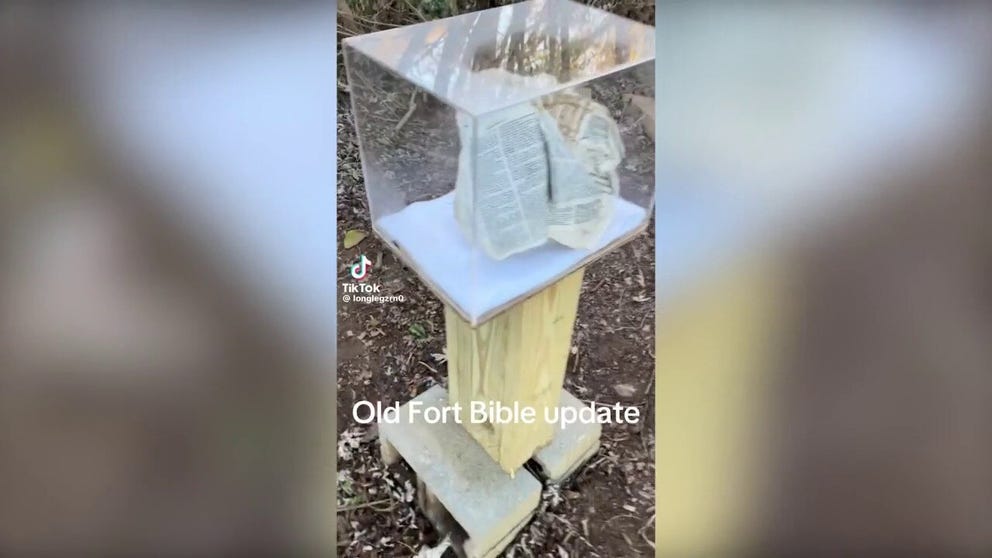 As the floodwater receded in western North Carolina, residents discovered a Bible that had become stuck on a fence post while opened to the Book of Revelation. (Courtesy: longlegzrn0/TikTok and Project First Light)