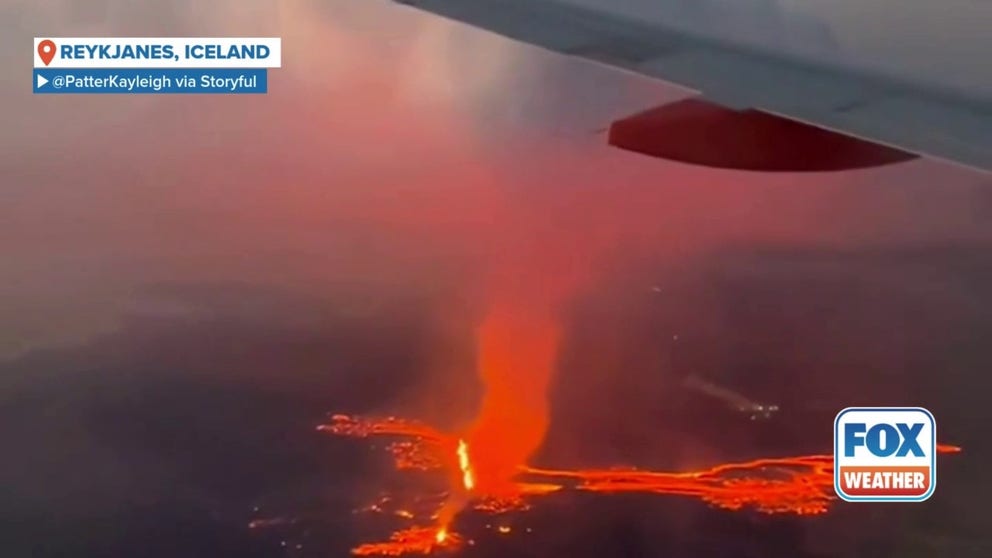 Video filmed by an EasyJet passenger shows the glowing volcanic eruption in Reykjanes from the window of the plane on Wednesday, Nov. 20. 