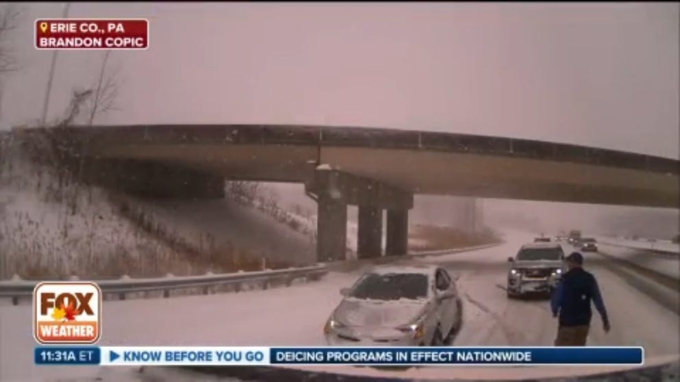 Storm trackers Corey Gerken and Brandon Copic teamed up along a very snowy interstate in Erie County, Pennsylvania to help pull a car stuck along the shoulder. "This was the third car we've rescued today so far," Gerken said.