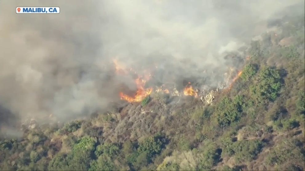 A video recorded from above shows the Franklin Fire scorching the landscape near Malibu, California, on Tuesday, Dec. 10, 2024.