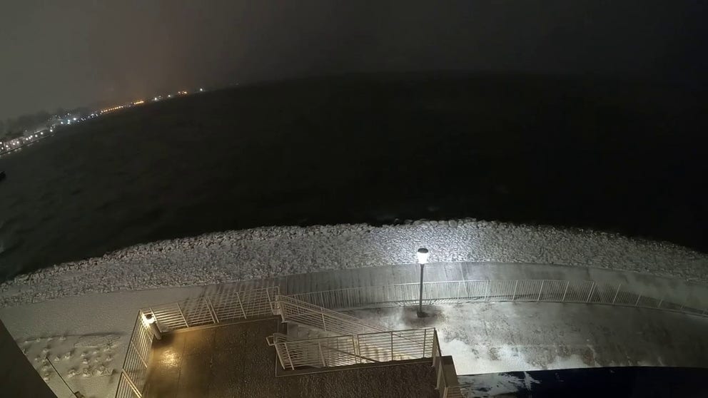 A timelapse video recorded in Erie, Pennsylvania, shows bands of lake-effect snow impacting the region on Wednesday, Dec. 11, 2024.