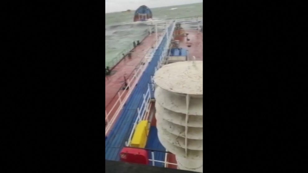 Two Russian oil tankers were heavily damaged by a heavy storm on Sunday and spilled oil into the sea.