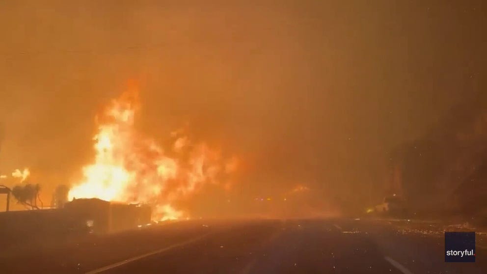 Footage shot on Tuesday captures images of the Palisades Fire burning buildings and power lines along the Pacific Coast Highway in Los Angeles.