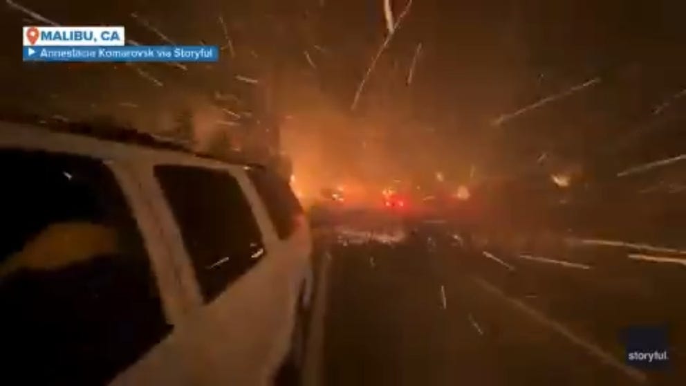 Multiple homes burned along a Malibu street as the Palisades Fire swept through several neighborhoods. (Video courtesy: Annestacia Komarovsk via Storyful)