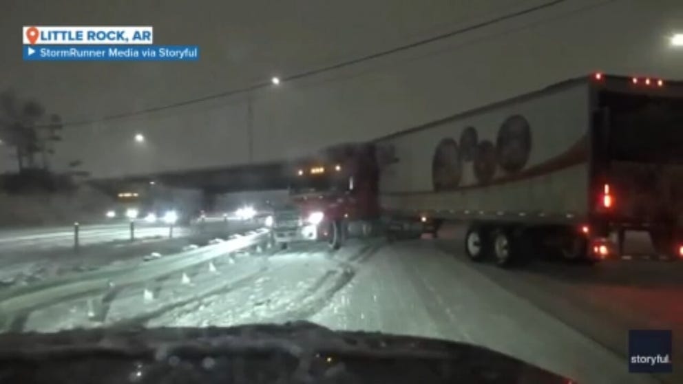 A semi-truck had a close call on the snowy I-430 highway in Little Rock, Arkansas Thursday as it skidded into the traffic barrier.