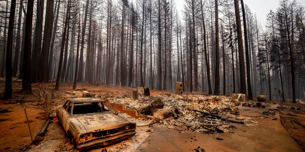 Raging Caldor Fire destroys small California town as dozens of homes