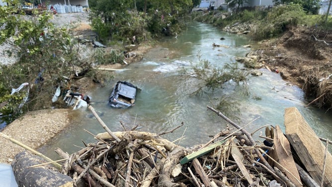 Car in creek due to Tennessee flash flood