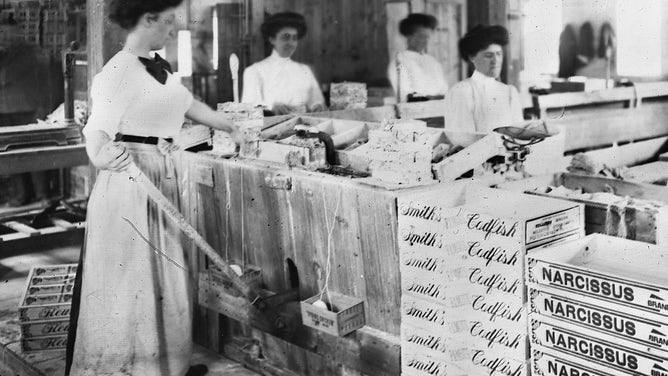 Women packing fish at Sylvanus Smith & Co. c 1899. photo: Herman W. Spooner.