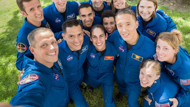 The members of the 2017 NASA Astronaut Class are (from left) Josh Kutryk, Bob Hines, Warren Hoburg, Frank Rubio, Raja Chari, Matthew Dominick, Jasmin Moghbeli, Jessica Watkins, Jenny Sidey, Jonny Kim, Kayla Barron, Zena Cardman, and Loral O' Hara..