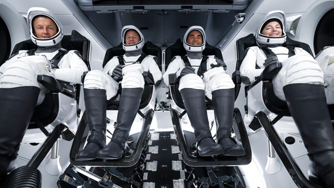 NASA astronauts Raja Chari, Tom Marshburn, and Kayla Barron, along with ESA astronaut Matthias Maurer, inside the SpaceX Crew Dragon spacecraft during a dress rehearsal ahead of the Oct. 31 launch.