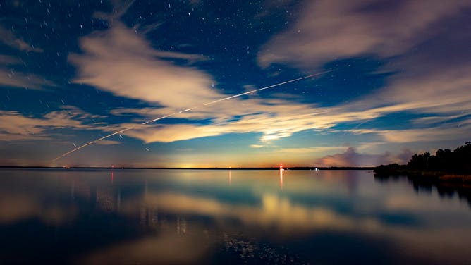 The Dragon spacecraft streaks across the night sky over Florida on Sept. 31, 2021.