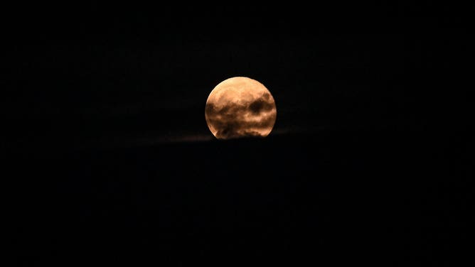 The harvest moon above Dublin, Ireland.