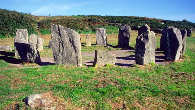 Drombeg Stone Circle in County Cork, Ireland. Built by the Celts, the circle of standing stones dates back to between 153 B.C. and 127 A.D.