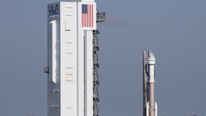 A United Launch Alliance Atlas V rocket with Boeing’s CST-100 Starliner spacecraft onboard is seen near the Vertical Integration Facility at Cape Canaveral Space Force Station in Florida.