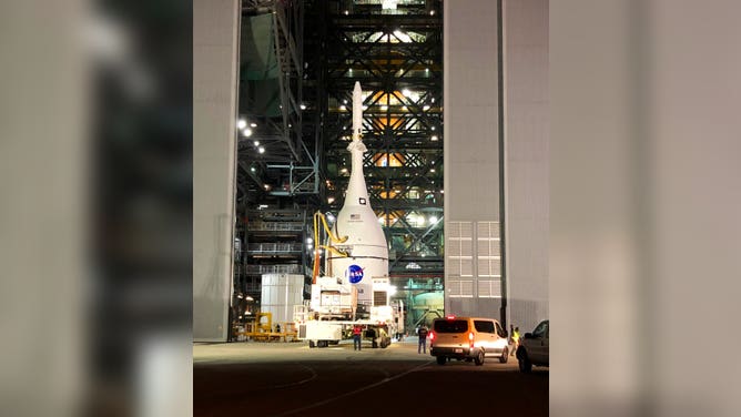 The Orion spacecraft is rolled into the Kennedy Space Center Vehicle Assembly Building on Oct. 19, 2021.