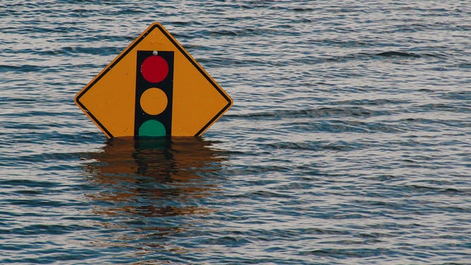 FILE - Flooded street.