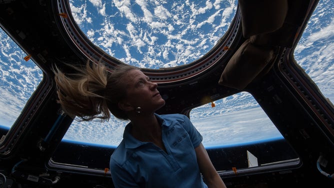 NASA Astronaut Karen Nyberg in the International Space Station cupola.