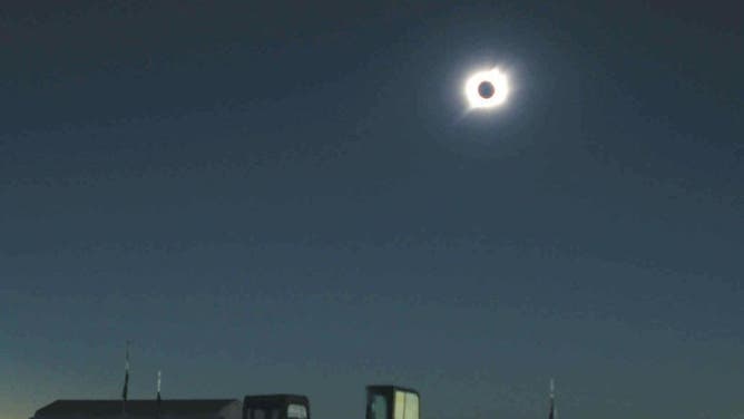 This wide view shows a picture released by the Japanese Antarctic observation team, 24 November 2003, of the solar eclipse taken from the Dome Fuji, some 1,000 kilometres south of the Japanese observation base at Showa. It was visible for barely two minutes, but enthusiastic umbraphiles were happy to pay almost 9,000 USD to catch a glimpse of that rarest of solar wonders -- a total eclipse above the South Pole. AFP PHOTO/JIJI PRESS (Photo by AFP / JIJI PRESS / AFP) / Japan OUT (Photo credit should read AFP/AFP via Getty Images)