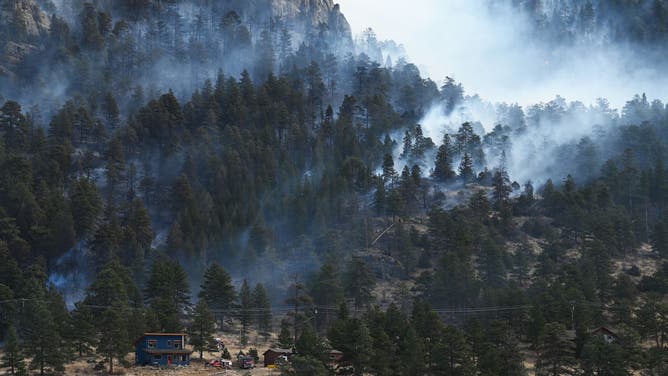 The Kruger Rock Fire continues to burn on November 16, 2021 in Estes Park, Colorado. (Photo by RJ Sangosti/MediaNews Group/The Denver Post via Getty Images)