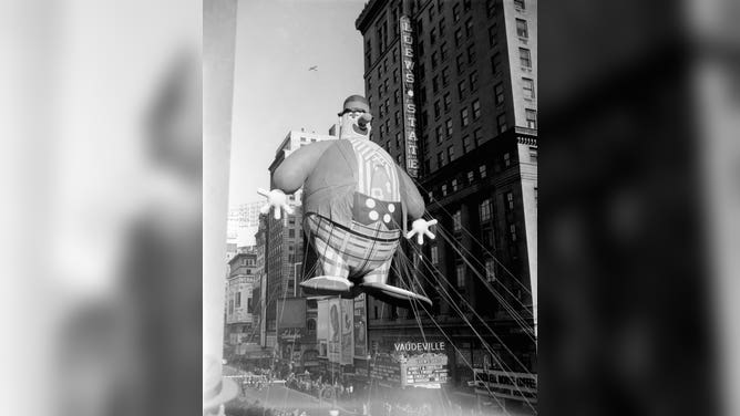 Large balloons pass overhead during the 1945 Macy's Thanksgiving Day Parade.
