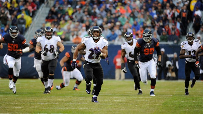 Ray Rice #27 of the Baltimore Ravens runs against the Chicago Bears on November 17, 2013 at Soldier Field in Chicago, Illinois.