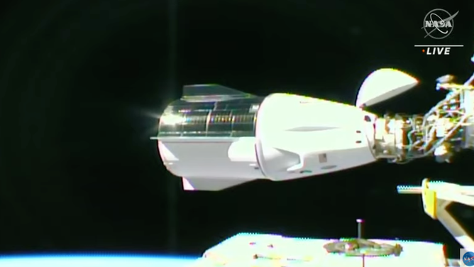 SpaceX Dragon spacecraft docked at the International Space Station.