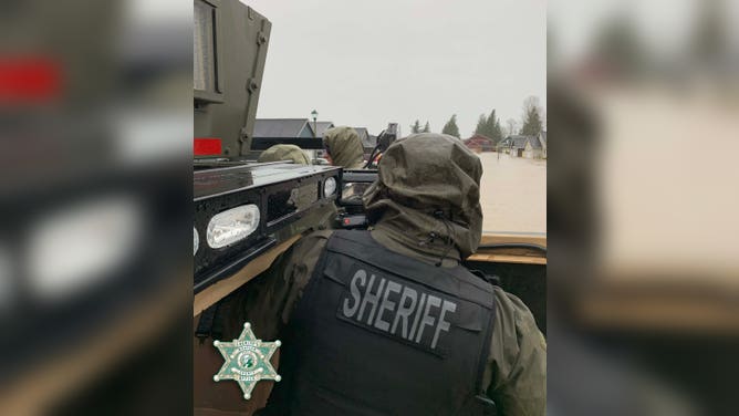 Images show the Whacom County Sheriff's Office rescuing trapped residents in Everson on Monday, Nov. 15, 2021.