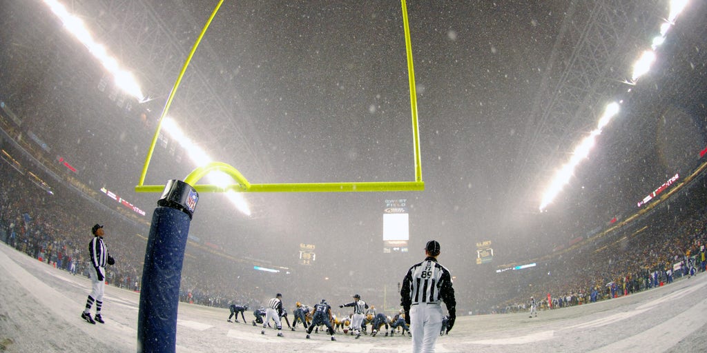 Ravens and fans brave the elements in coldest home game in