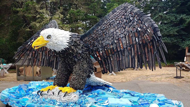 Washed ashore bald eagle sculpture