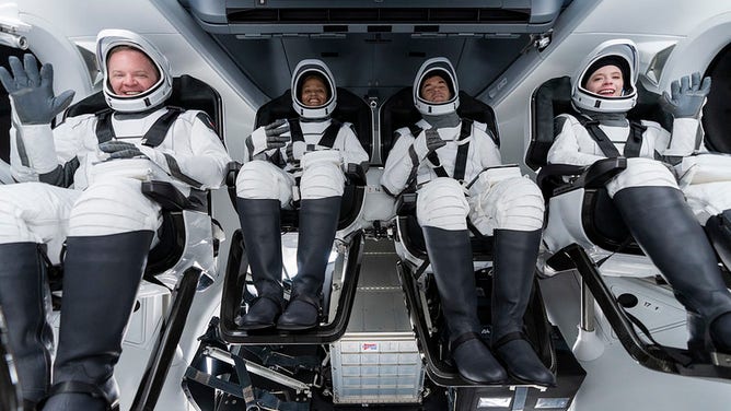 The Inspiration4 crew inside the Crew Dragon spacecraft.