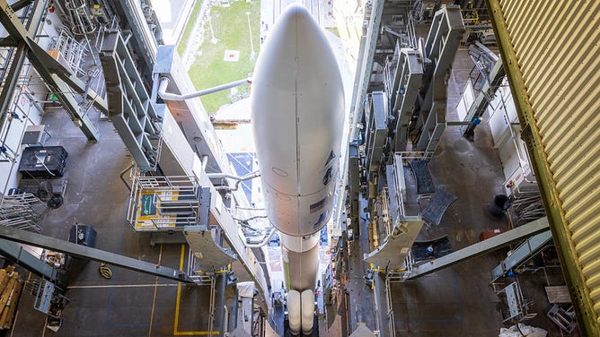 A United Launch Alliance (ULA) Atlas V rocket with the United States Space Force’s Space Test Program (STP)-3 mission rolls from the Vertical Integration Facility (VIF) to the launch pad at Space Launch Complex-41 at Cape Canaveral Space Force Station, Florida.