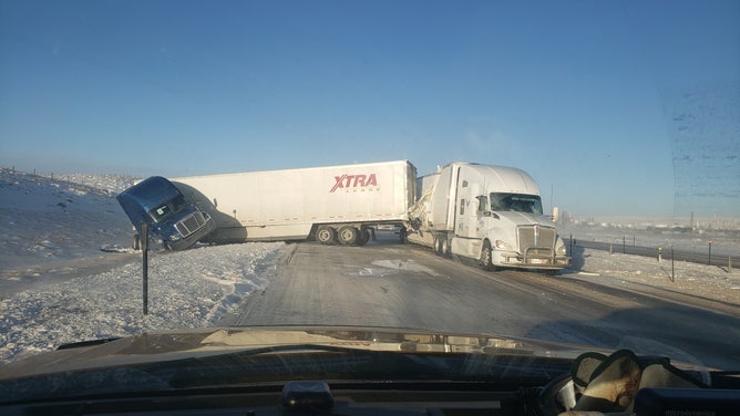Semi-trucks slid off I-80 in Wyoming due to windy conditions.