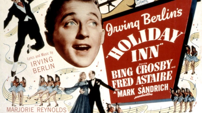 A "Holiday Inn" lobby card. According to the Library of Congress, lobby cards were smaller versions of movie posters that were intended for display in a theater lobby or showcase window.