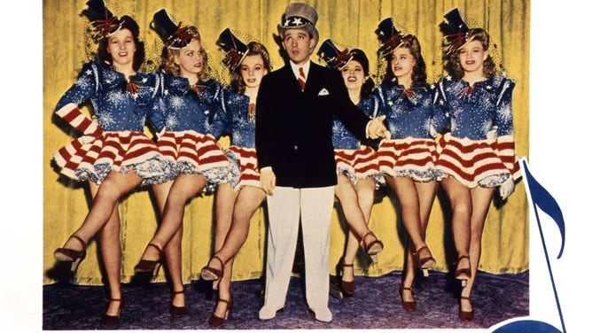 Lobby card of "Holiday Inn", with Bing Crosby at center.
