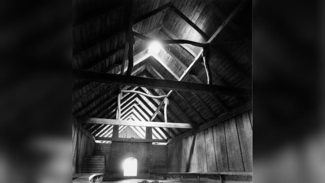 Interior view of reconstructed 10th-century Viking barracks in Trelleborg, Sweden.