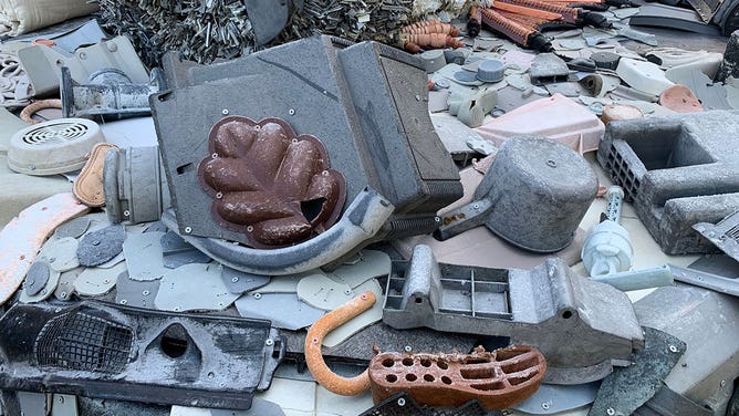 Washed ashore penguin sculpture