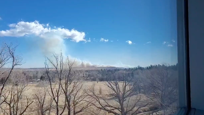 A screenshot of a grassfire near the National Weather Service Office in Boulder. (Image: NWS Boulder)