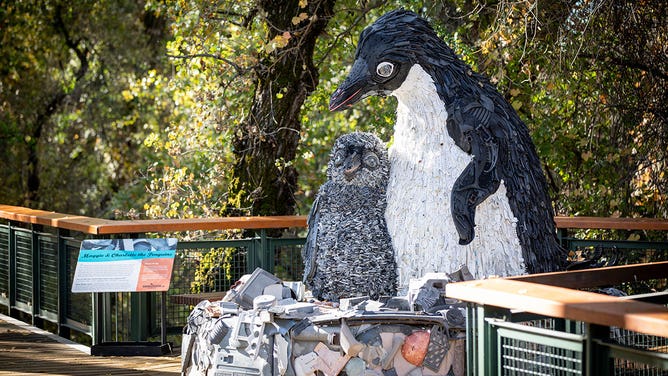 Washed ashore penguin sculpture