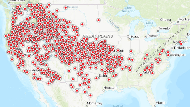 Red dots denote some of the U.S. locations reporting record warmth in December.