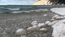 Holy ice balls! Video captures rare sight along Michigan lake