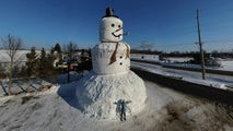 Family builds 40-foot-tall snowman in Wisconsin