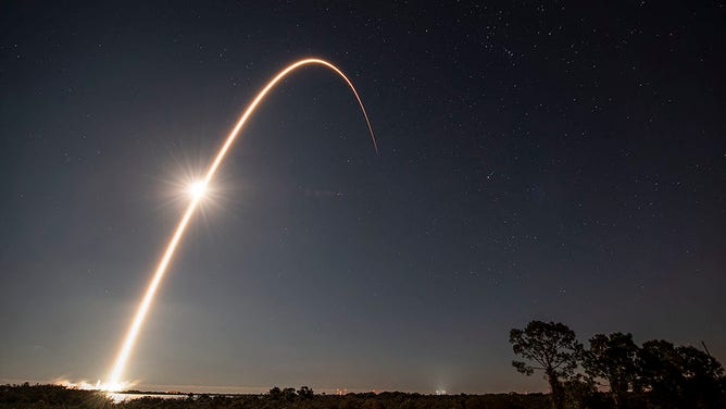 A SpaceX Falcon 9 launches from Kennedy Space Center on Jan. 18, 2022. 