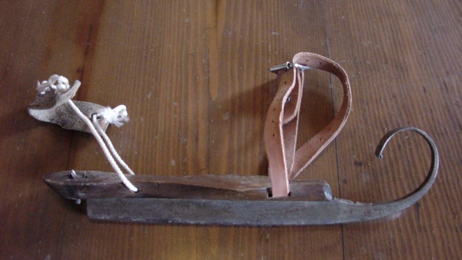 Original skates with a curled metal blade attached to wood, dating to A.D. 1400. They are housed at the Schaatsmuseum in the Netherlands.