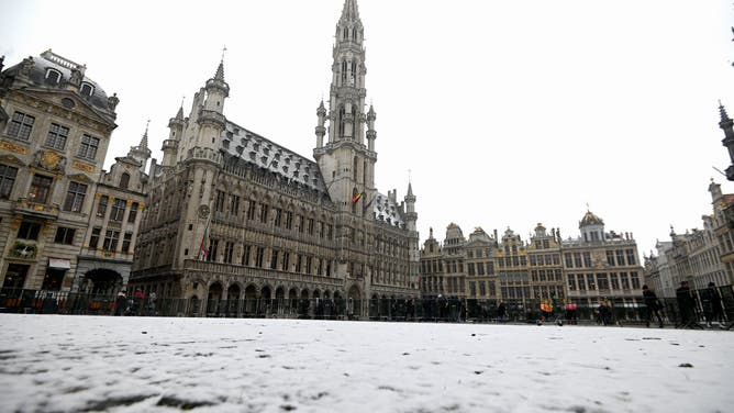 A layer of snow covers Brussels' Grand Place in 2019. Over 500 years earlier, the city was a hotbed of snowman-filled protests.