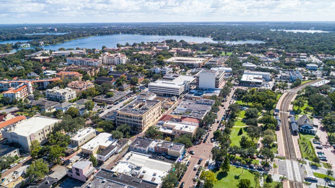 Florida, Winter Park, Orlando, aerial of Amtrak Sunrail Train Station and lake Virginia. (Photo by: Jeffrey Greenberg/Universal Images Group via Getty Images)