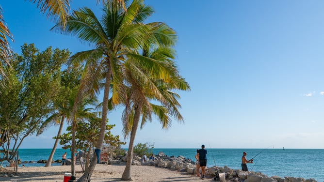 Visitors enjoy the sunshine in Key West, Florida.