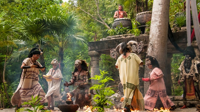 A group in Mexico conducts a performance honoring the Mayan god of cacao.