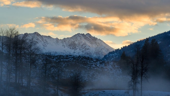 In Idaho, Bowery Hot Springs steam up with the Boulder Mountains in the background.